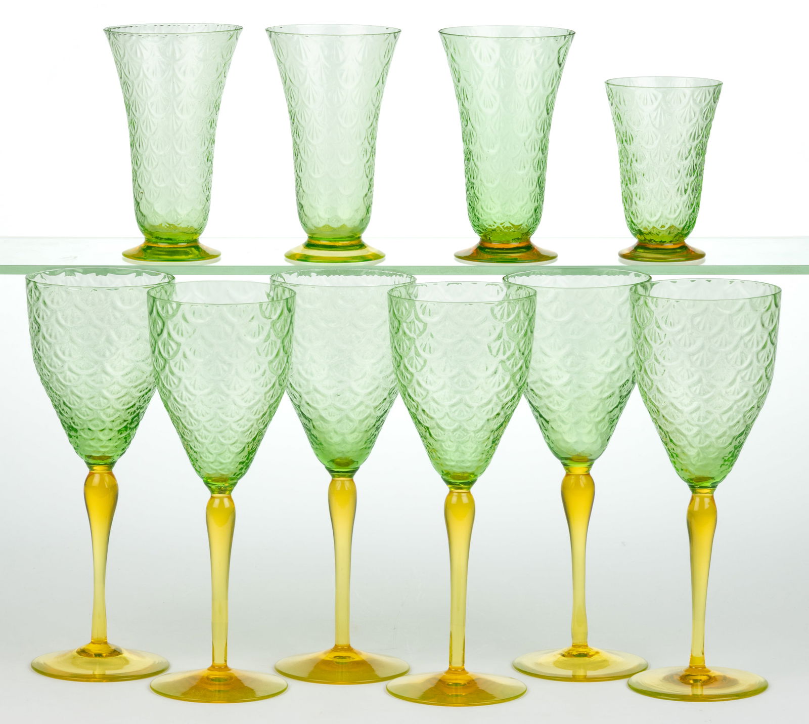 PUKEBERG TURKEY TRACKS / ROYAL FAN DRINKING ARTICLES, LOT OF TEN: PUKEBERG TURKEY TRACK / ROYAL FAN DRINKING ARTICLES, LOT OF TEN, uranium green (reacts under black light) with applied amber-toned Vaseline (reacts under black light) stems and feet, comprising t