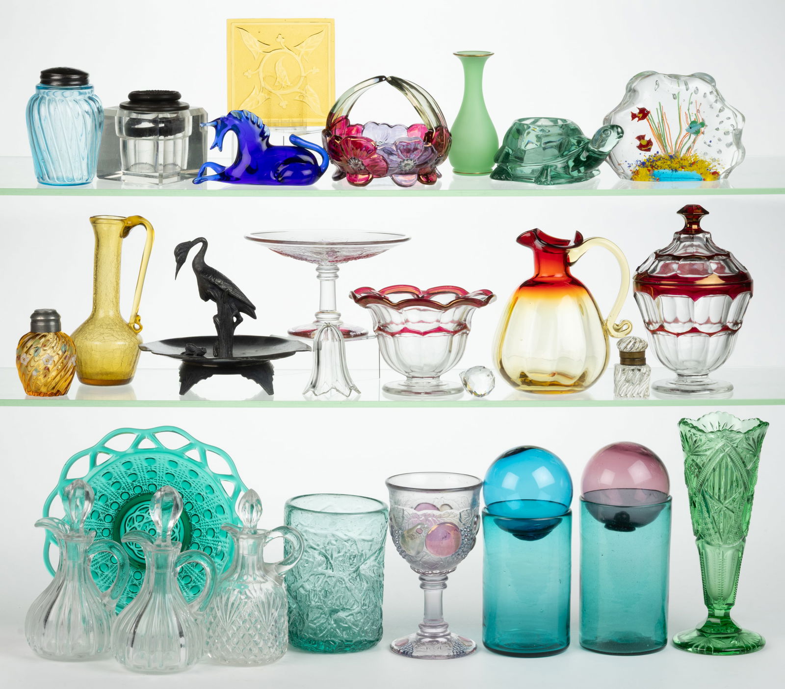 ASSORTED BLOWN AND PRESSED GLASS AND OTHER ARTICLES, LOT OF 29: ASSORTED BLOWN AND PRESSED GLASS AND OTHER ARTICLES, LOT OF 29, including a Murano lampwork paperweight, an amber pressed window pane, a blue Swirl sugar shaker, a Victorian quadruple-plate card