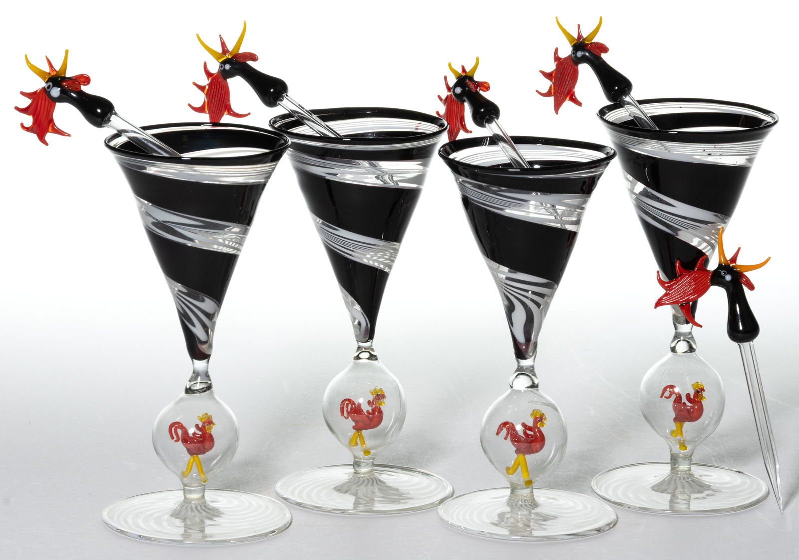 GERMAN ART GLASS BIMINI-TYPE ROOSTER WINE / COCKTAIL GLASSES AND COCKTAIL PICKS, ASSEMBLED SET OF: GERMAN ART GLASS BIMINI-TYPE ROOSTER WINE / COCKTAIL GLASSES AND COCKTAIL PICKS, ASSEMBLED SET OF NINE, black and white swirl on colorless, each having a lampwork figure of a red rooster in the stem,