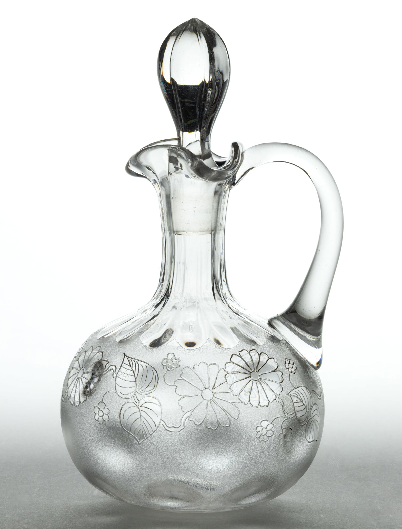 POMONA / LOCKE'S TRADITIONAL DAISY - SECOND-PATENT ETCHING CRUET: POMONA / LOCKE'S TRADITIONAL DAISY -SECOND-PATENT ETCHING CRUET, colorless, bulbous Dot-Optic form with Rib-Optic neck and etched to the body, applied handle, polished pontil mark, original