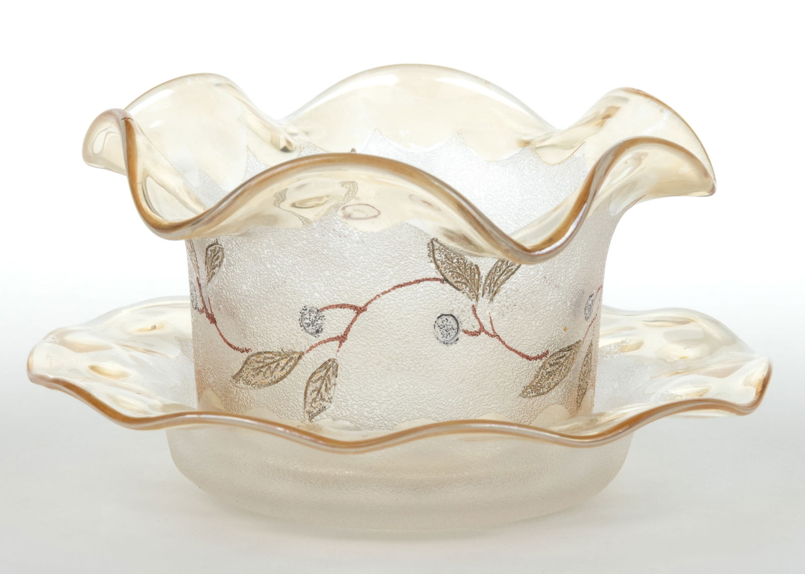 POMONA BLUEBERRY - SECOND-PATENT ETCHING ART GLASS DESSERT CUP AND UNDERPLATE: POMONA BLUEBERRY - SECOND-PATENT ETCHING ART GLASS DESSERT CUP AND UNDERPLATE, each colorless with amber iridescence and Diamond-Optic form, the ruffled rim cup with gilt, iridescent, and painted