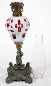 CUT OVERLAY STAR AND QUATREFOIL WITH FIGURAL STEM KEROSENE STAND LAMP