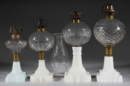 ASSORTED PATTERN FONT KEROSENE STAND LAMPS, LOT OF FOUR