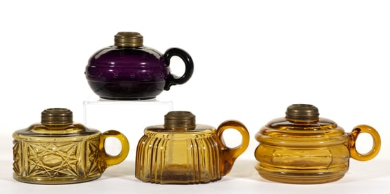 ASSORTED COLORED GLASS KEROSENE FINGER LAMPS, LOT OF FOUR