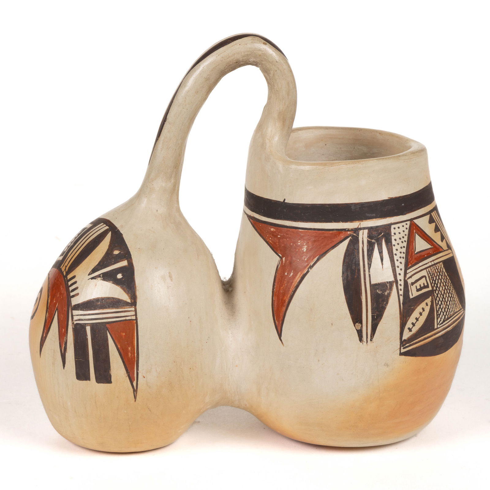 SIGNED NELLIE NAMPEYO (1896-1978) NATIVE AMERICAN HOPI-TEWA POTTERY DOUBLE-LOBED CANTEEN: SIGNED NELLIE NAMPEYO (1896-1978) NATIVE AMERICAN HOPI-TEWA POTTERY DOUBLE-LOBED CANTEEN, featuring hand-painted avian decoration, signed to underside. Mid 20th century. 6 3/4" HOA