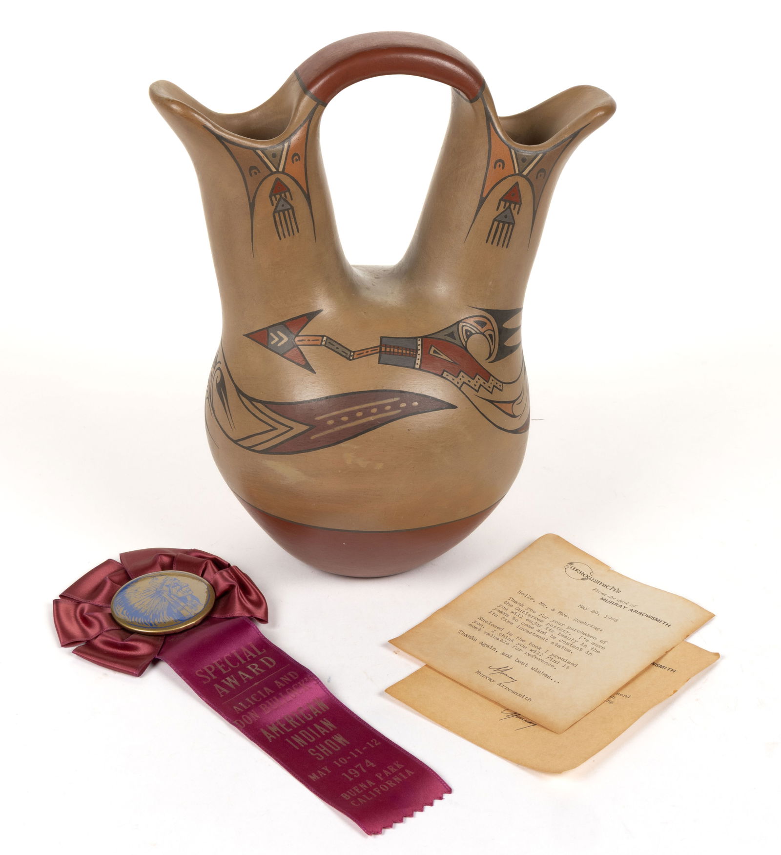 SIGNED LELA GUTIERREZ (1895-1966) AND VAN GUTIERREZ (1870-1956) NATIVE AMERICAN SANTA CLARA PUEBLO: SIGNED LELA GUTIERREZ (1895-1966) AND VAN GUTIERREZ (1870-1956) NATIVE AMERICAN SANTA CLARA PUEBLO POTTERY WEDDING VASE, traditional two-spout form with connected handle, encircled by Avanyu, a T