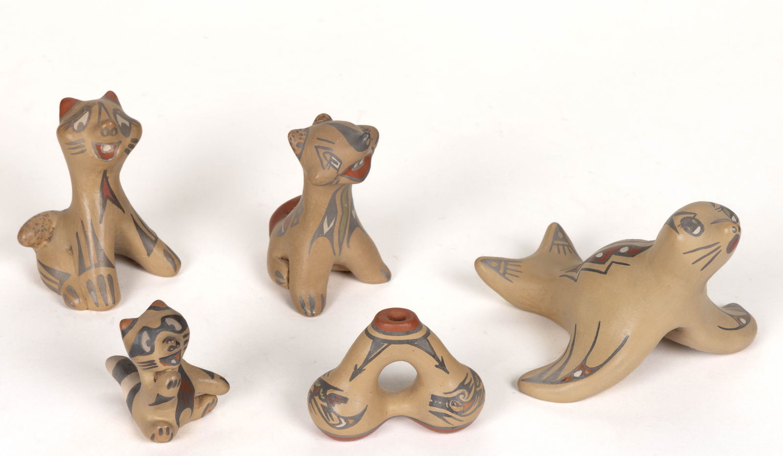 SIGNED MARGARET GUTIERREZ (1936-2018) AND LUTHER GUTIERREZ (1911-1987) NATIVE AMERICAN SANTA CLARA: SIGNED MARGARET GUTIERREZ (1936-2018) AND LUTHER GUTIERREZ (1911-1987) NATIVE AMERICAN SANTA CLARA PUEBLO POTTERY ANIMAL FIGURINES, LOT OF FOUR, polychrome hand-painted decoration, comprising a seal,