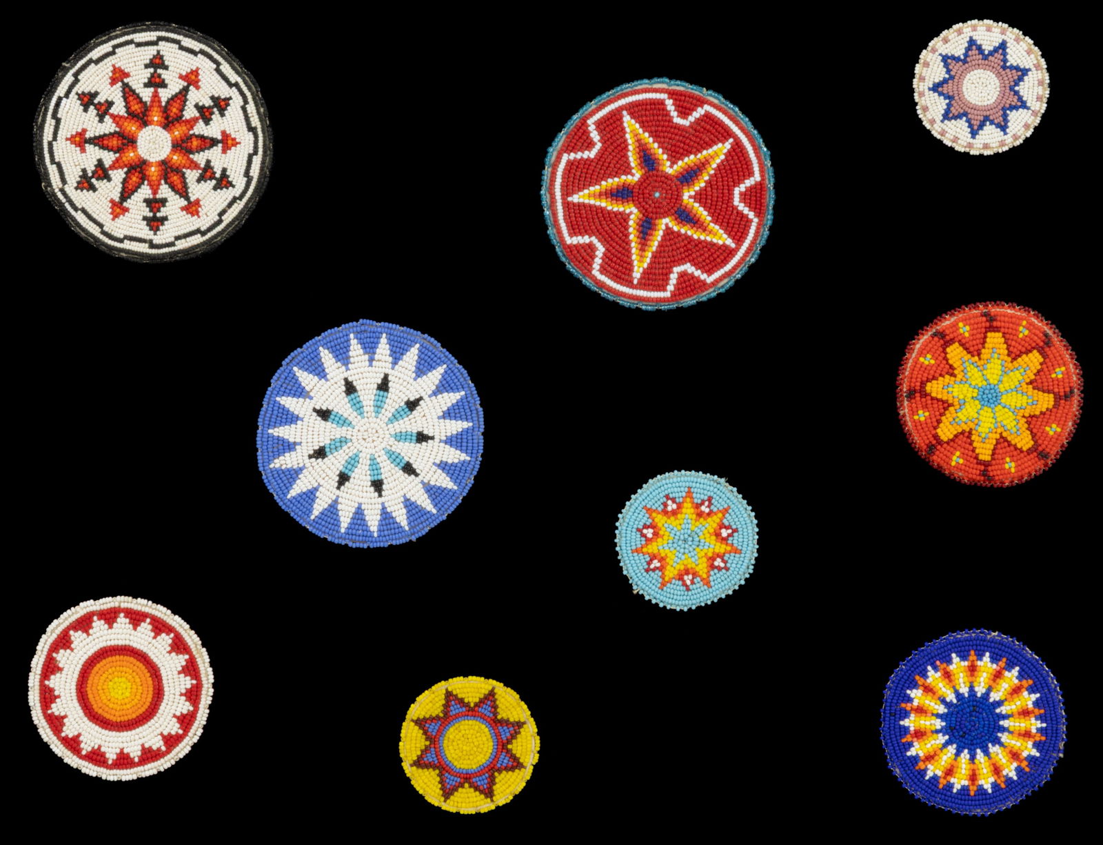 ASSORTED NATIVE AMERICAN BEADED MEDALLIONS, LOT OF NINE (1 of 1)