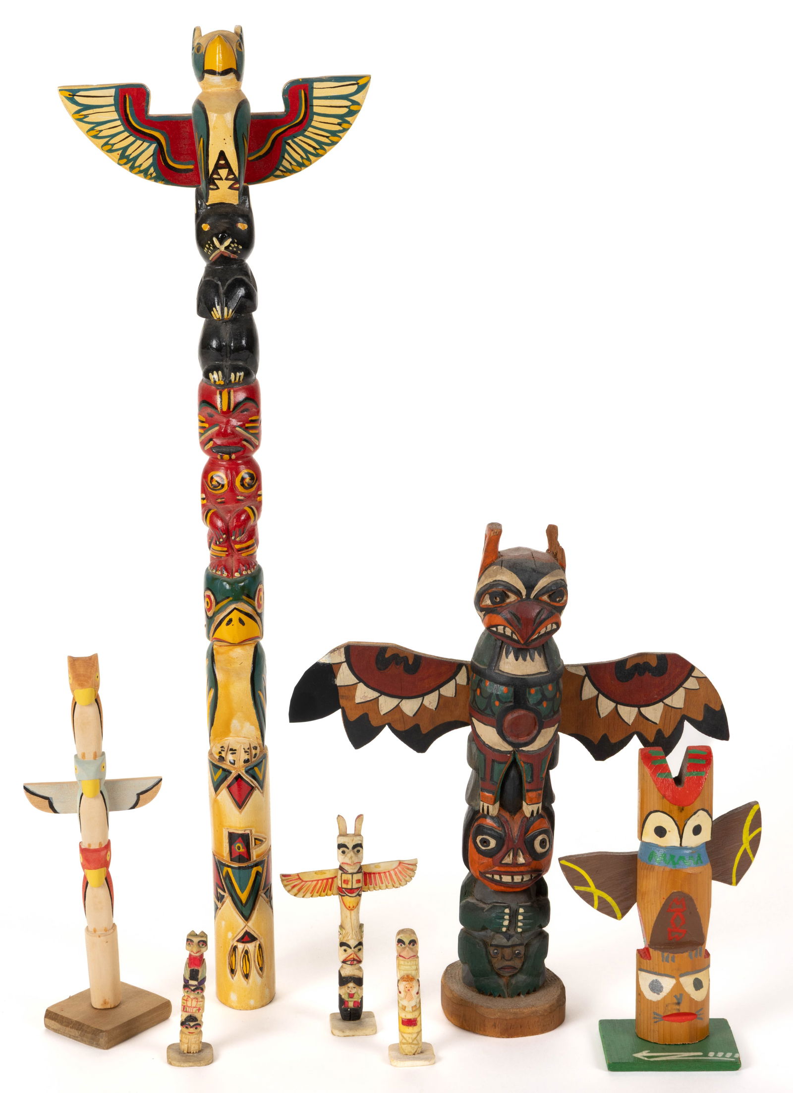 NATIVE AMERICAN MINIATURE TOTEM POLES, LOT OF SEVEN (1 of 4)