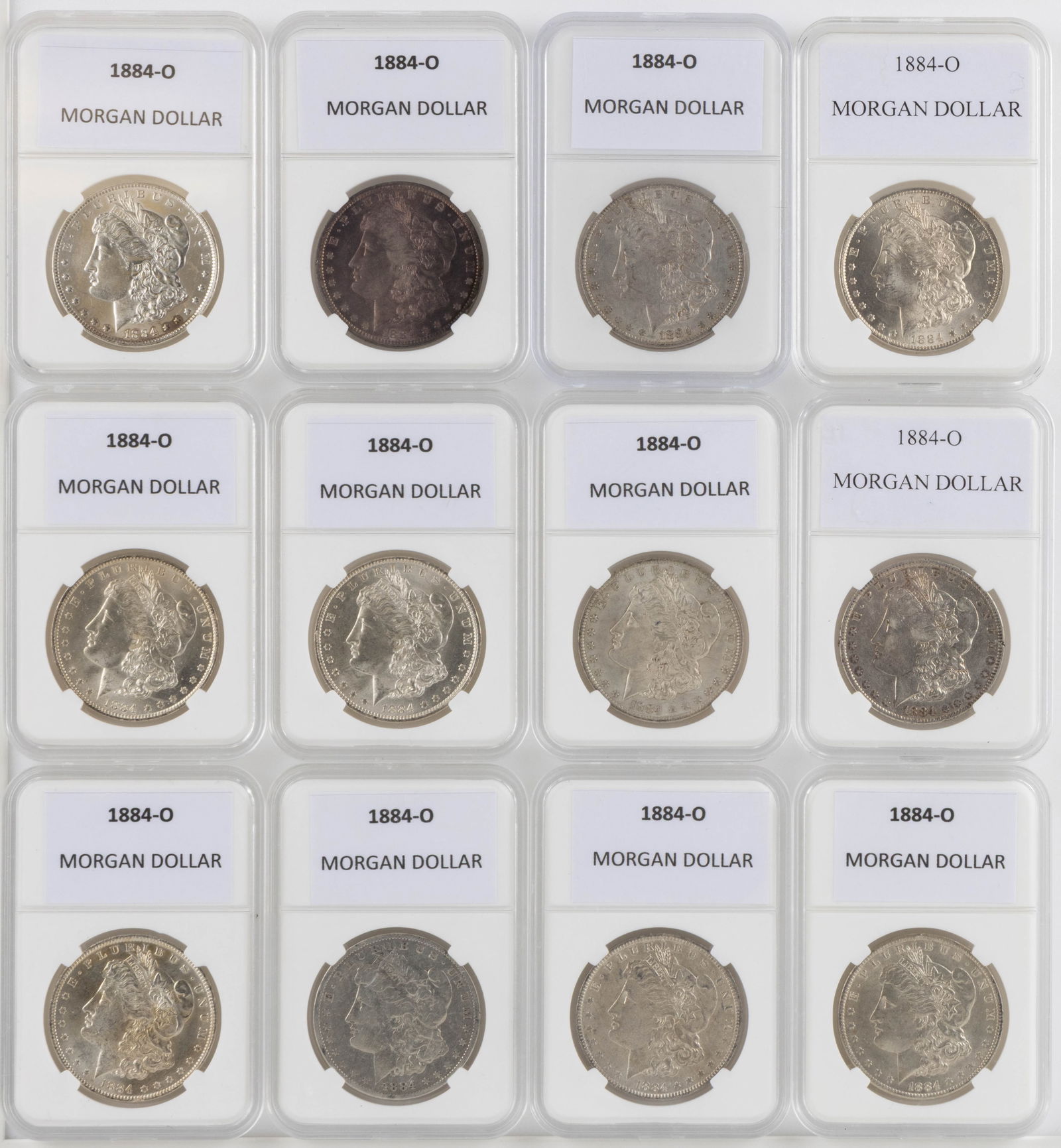 UNITED STATES 1884-O MORGAN SILVER DOLLAR COINS, LOT OF 12 (1 of 2)