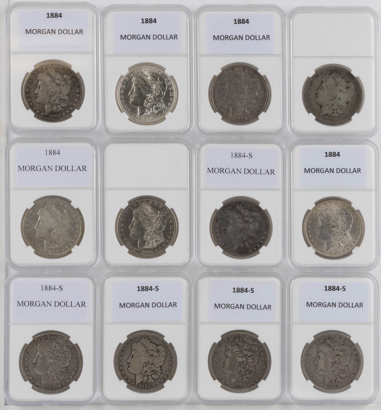 ASSORTED UNITED STATES 1884 MORGAN SILVER DOLLAR COINS, LOT OF 12 (1 of 2)