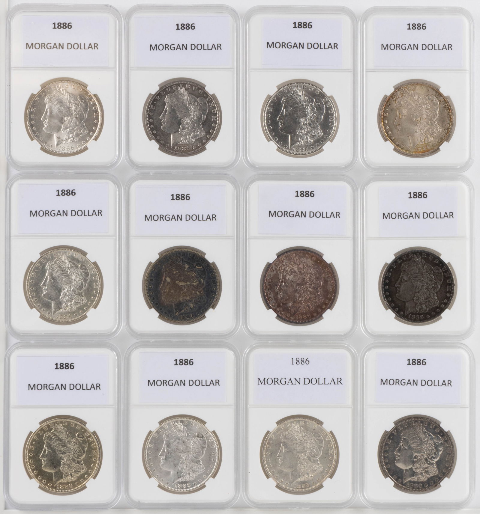 UNITED STATES 1886 MORGAN SILVER DOLLAR COINS, LOT OF 12 (1 of 2)