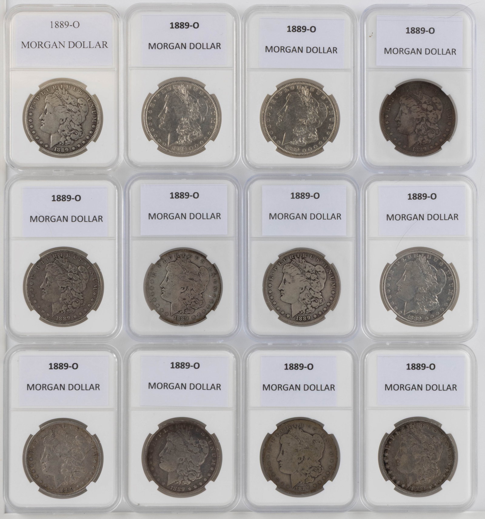 UNITED STATES 1889-O MORGAN SILVER DOLLAR COINS, LOT OF 12 (1 of 2)