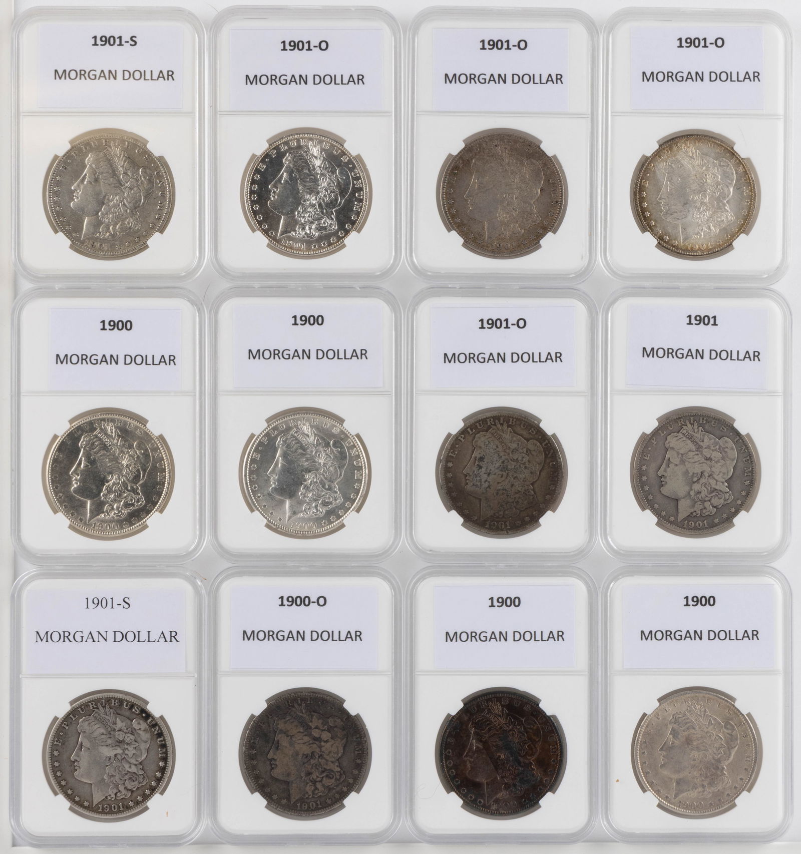 ASSORTED UNITED STATES MORGAN SILVER DOLLAR COINS, LOT OF 12: ASSORTED UNITED STATES MORGAN SILVER DOLLAR COINS, LOT OF 12, comprising four 1900, one 1900-O, one 1901, four 1901-O, and two 1901-S, each housed in a plastic presentation case. Provenance: From the