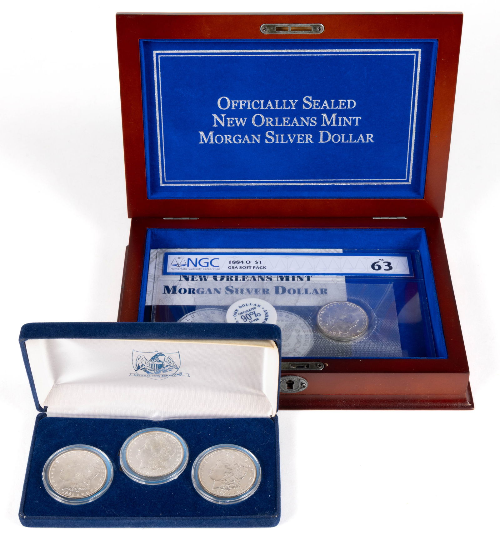 ASSORTED UNITED STATES MORGAN SILVER DOLLAR COINS, LOT OF FOUR: ASSORTED UNITED STATES MORGAN SILVER DOLLAR COINS, LOT OF FOUR, comprising one 1884-O and three 1885-O, each is housed in a plastic presentation case or sealed plastic sleeve. Provenance: From the co