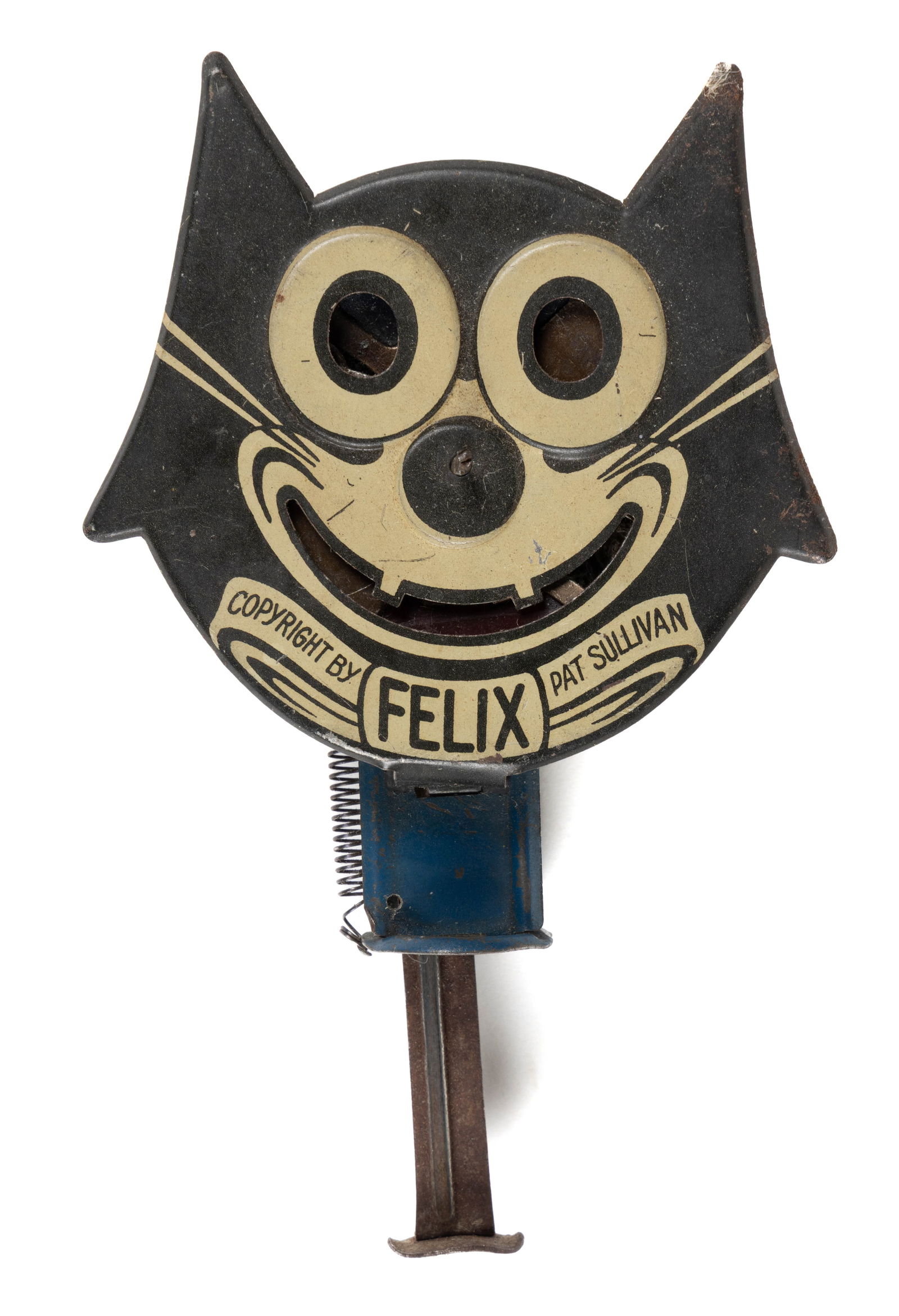 VINTAGE GERMAN TIN LITHOGRAPH FELIX THE CAT TOY SPARKLER: VINTAGE GERMAN TIN LITHOGRAPH FELIX THE CAT TOY SPARKLER, depicting the cat head in black and tan decoration, lower head marked "COPYRIGHT BY FELIX / PAT SULLIVAN", open arms and mouth, reve