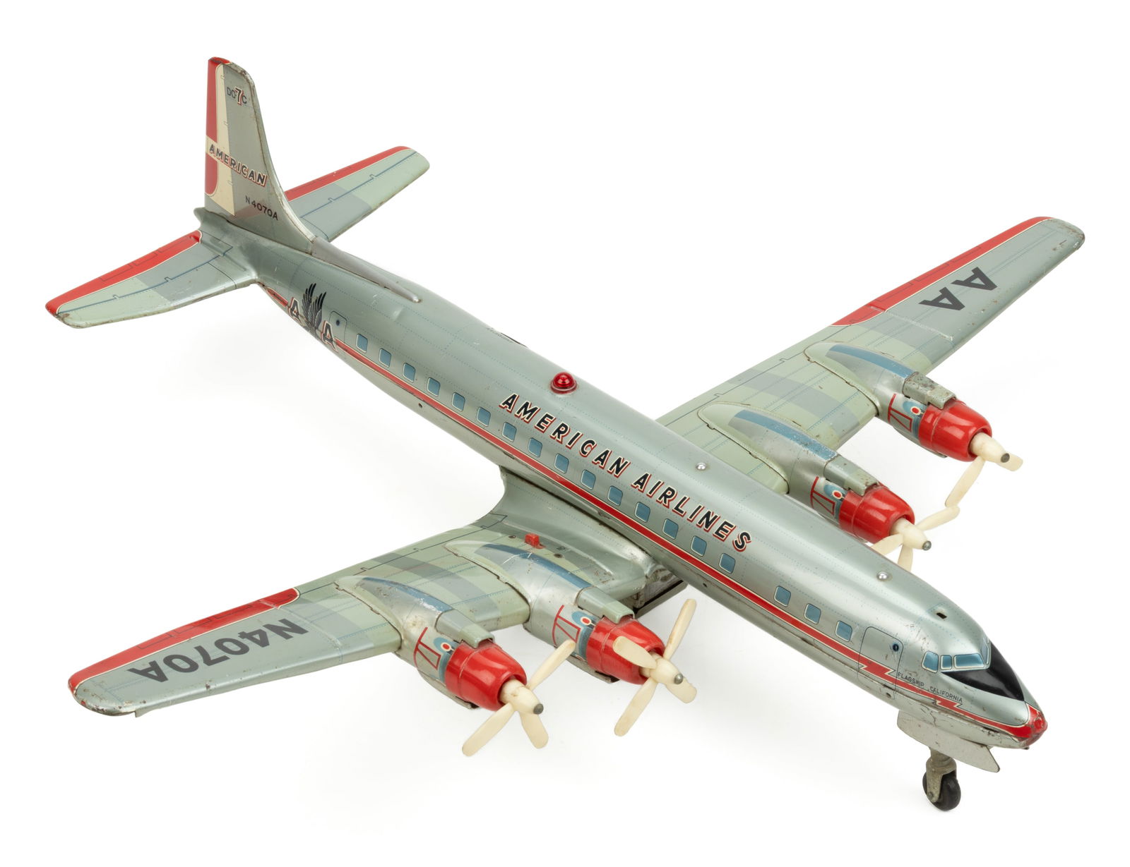 VINTAGE YONEZAWA TIN LITHOGRAPH AMERICAN AIRLINES DC-7C / N4070A BATTERY-OPERATED TOY AIRPLANE (1 of 2)