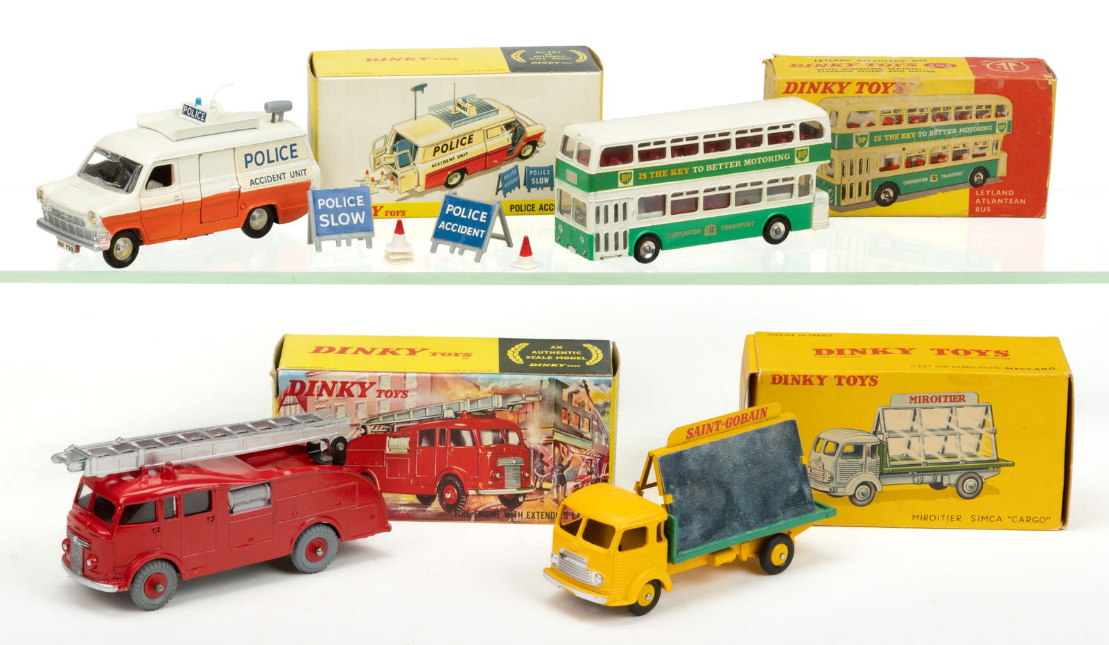 ASSORTED DINKY TOYS DIE-CAST COMMERCIAL VEHICLE TOYS, LOT OF FOUR: ASSORTED DINKY TOYS DIE-CAST COMMERCIAL VEHICLE TOYS, LOT OF FOUR, comprising a French No. 33C Miroitier Simca Cargo truck; a No. 955 fire engine with extending ladder; a No. 287 police accident unit;