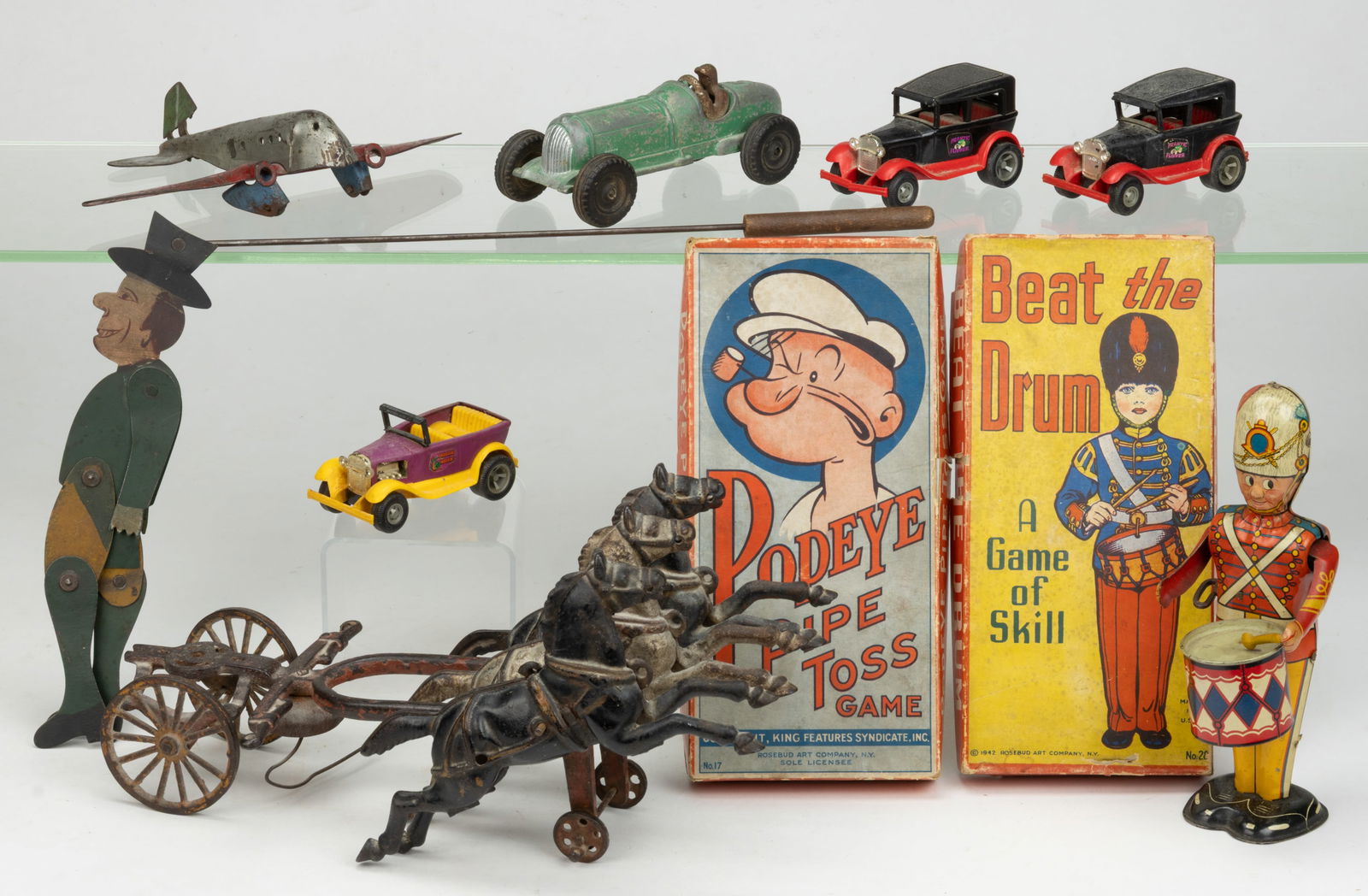 ASSORTED CAST-IRON AND OTHER CHILDREN'S TOYS, LOT OF TEN (1 of 1)