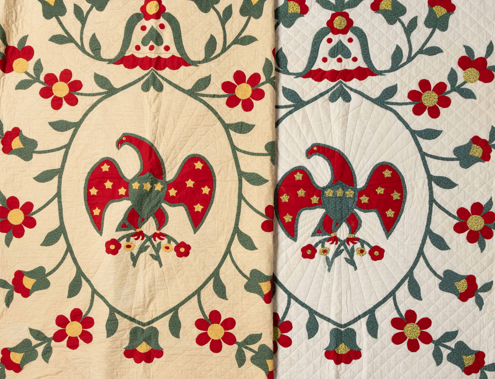 AMERICAN PARAGON NEEDLECRAFT NO. 01147 "AMERICAN GLORY" APPLIQUE KIT QUILTS, PAIRING: AMERICAN PARAGON NEEDLECRAFT NO. 01147 "AMERICAN GLORY" APPLIQUE KIT QUILTS, PAIRING, each hand-stitched with machine-stitched panels, having a central navette-shaped floral vine vignette fe