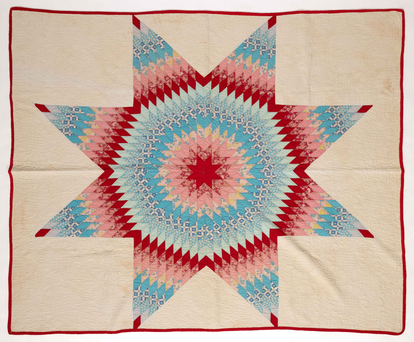 AMERICAN "LONE STAR / STAR OF BETHLEHEM" PIECED QUILT: AMERICAN "LONE STAR / STAR OF BETHLEHEM" PIECED QUILT, hand- and machine-stitched, completed in polychrome solid and print fabrics, large center eight-point star formed by diamond-shaped blo