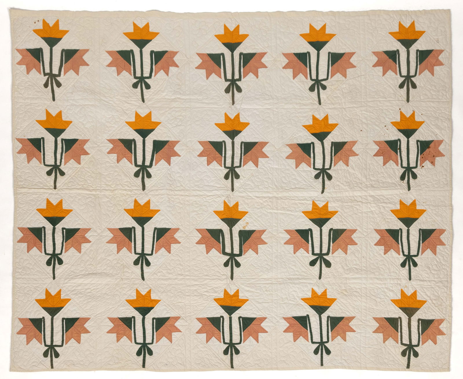 AMERICAN "LILY" APPLIQUE AND PIECED QUILT: AMERICAN "LILY" APPLIQUE AND PIECED QUILT, hand-stitched, completed in cheddar-colored, peach pink, green, and white solid fabrics, 20 on-point pattern pieced blocks with applique stems and