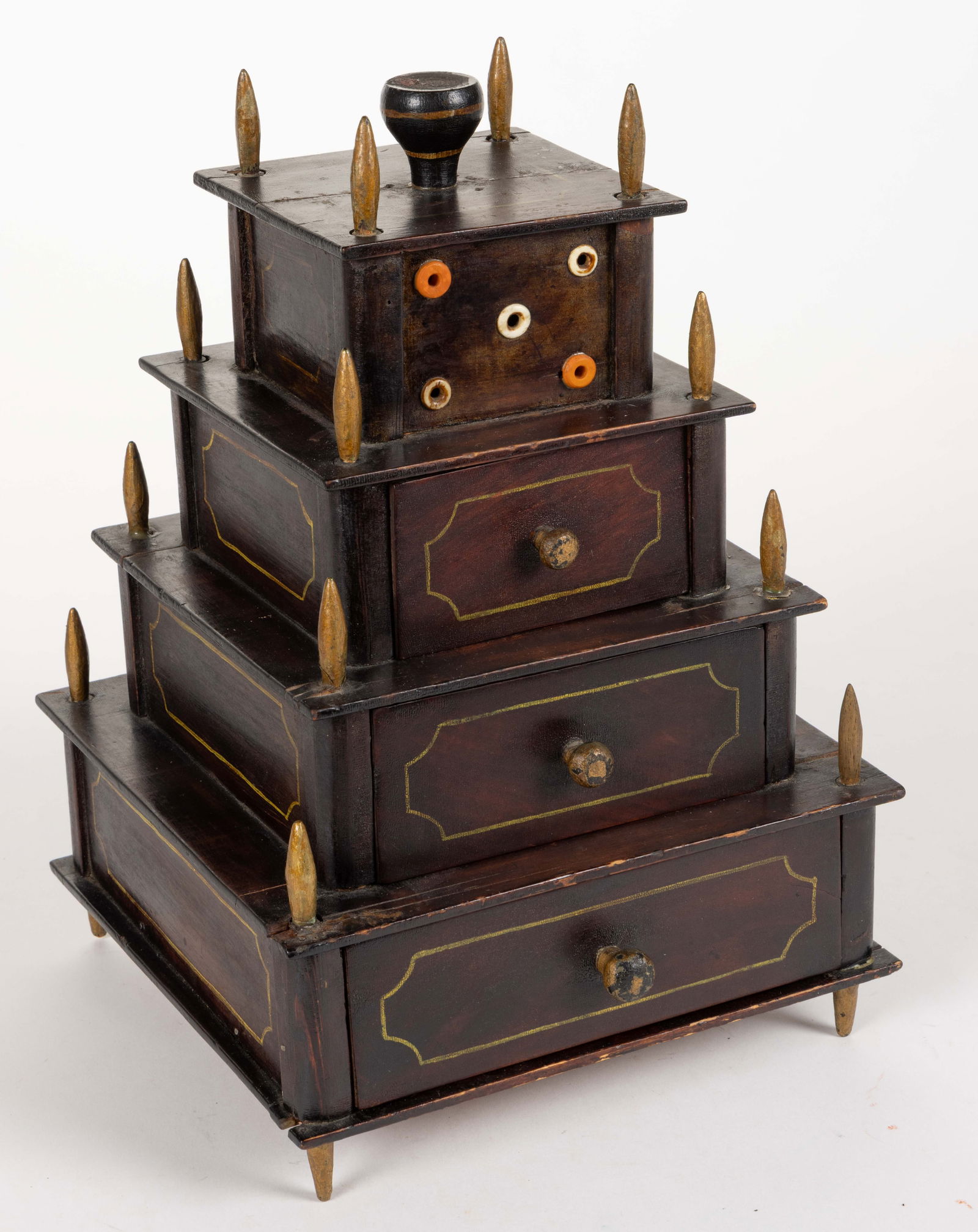 AMERICAN PAINT-DECORATED TIERED NEEDLEWORKING / SEWING STAND: AMERICAN PAINT-DECORATED TIERED NEEDLEWORKING / SEWING STAND, four-tiered design featuring a removable top cover with space for four spools on the interior and holes through which to pull the thread t