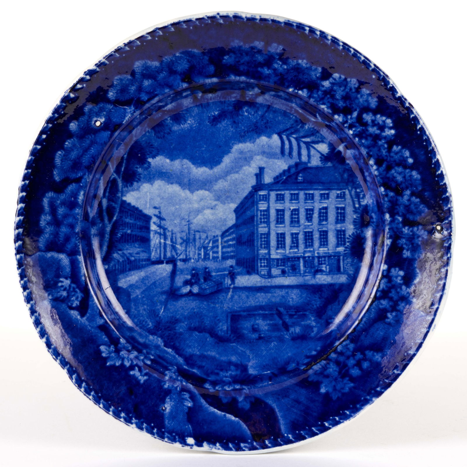 STAFFORDSHIRE AMERICAN / BOSTON VIEW TRANSFER-PRINTED CERAMIC PLATE: STAFFORDSHIRE AMERICAN VIEW TRANSFER-PRINTED CERAMIC PLATE, featuring "MITCHELL & FREEMAN / CHINA & GLASS WAREHOUSE / CHATHAM ST BOSTON", as printed to underside, depicting storehous