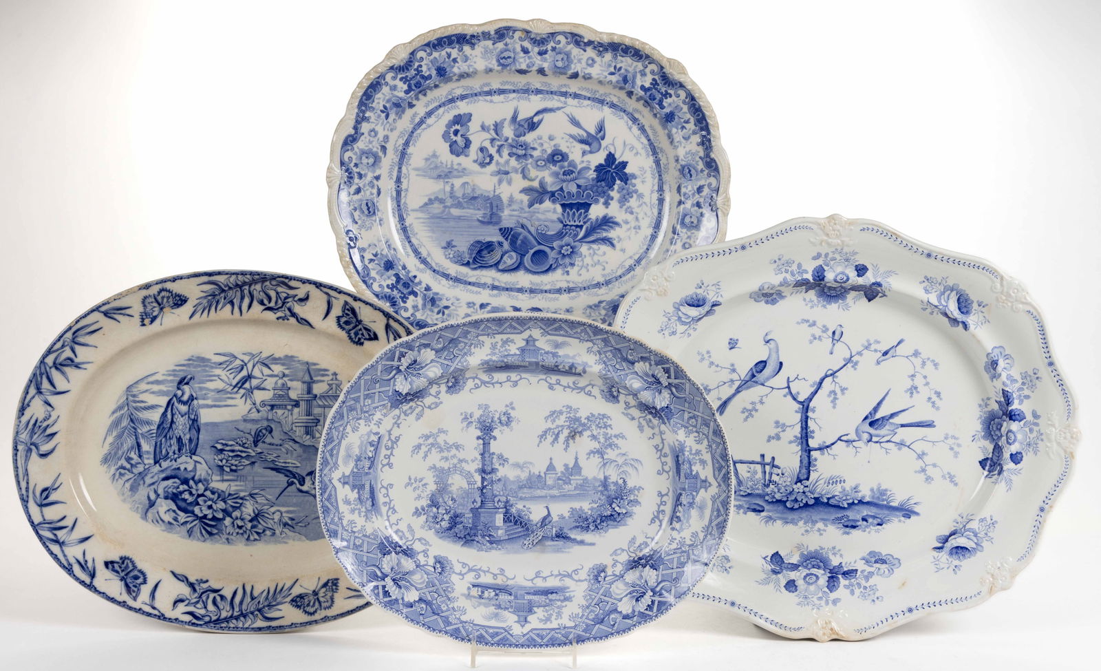 STAFFORDSHIRE BLUE TRANSFER-PRINTED BIRD MOTIF CERAMIC PLATTERS, LOT OF FOUR (1 of 9)