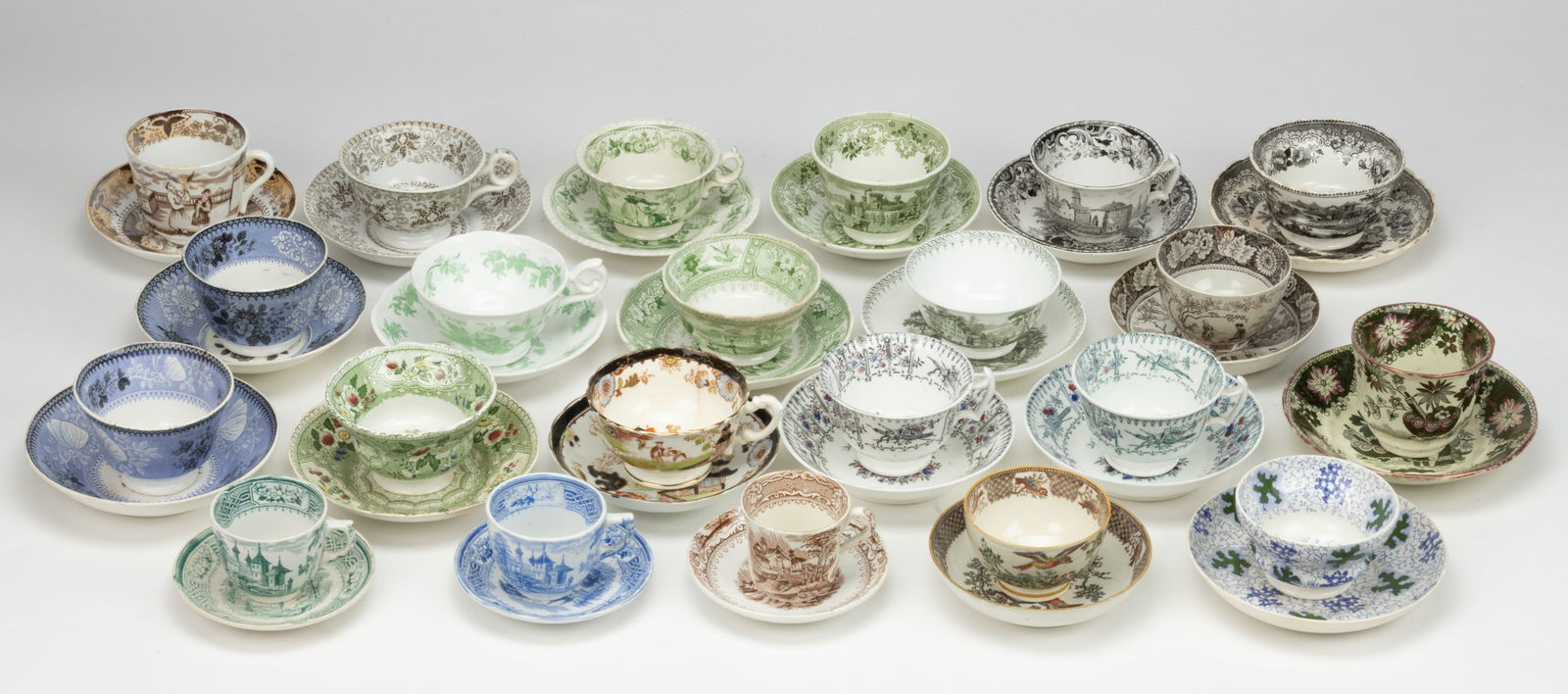STAFFORDSHIRE TRANSFER-PRINTED CERAMIC CUP AND SAUCER SETS, LOT OF 22 (1 of 1)