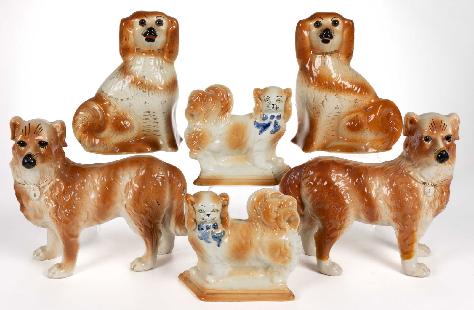 ENGLISH STAFFORDSHIRE HAND-PAINTED CERAMIC DOG PAIRS, LOT OF THREE (1 of 3)