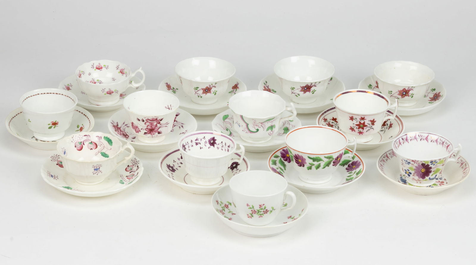 BRITISH HAND-PAINTED CERAMIC FLORAL MOTIF CUP AND SAUCER SETS, LOT OF 13 (1 of 1)