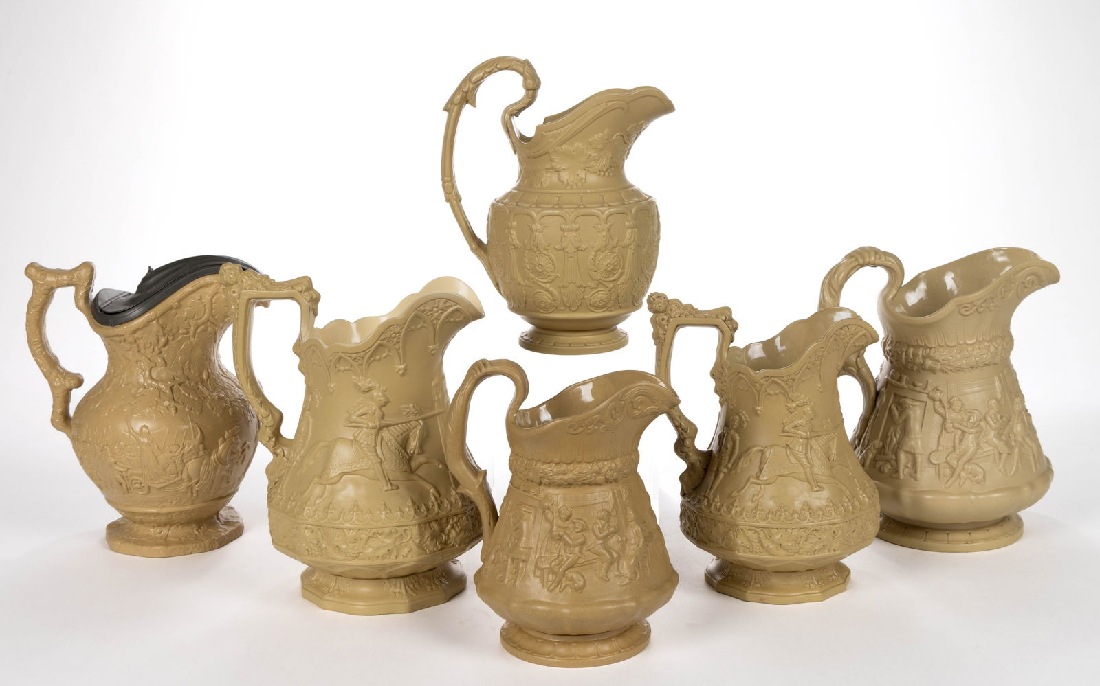 ENGLISH RELIEF-MOLDED STONEWARE JUGS / PITCHERS, LOT OF SIX (1 of 2)