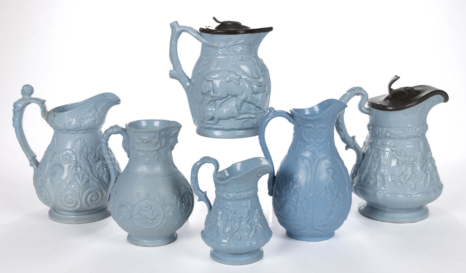 ENGLISH RELIEF-MOLDED STONEWARE JUGS / PITCHERS, LOT OF SIX (1 of 2)