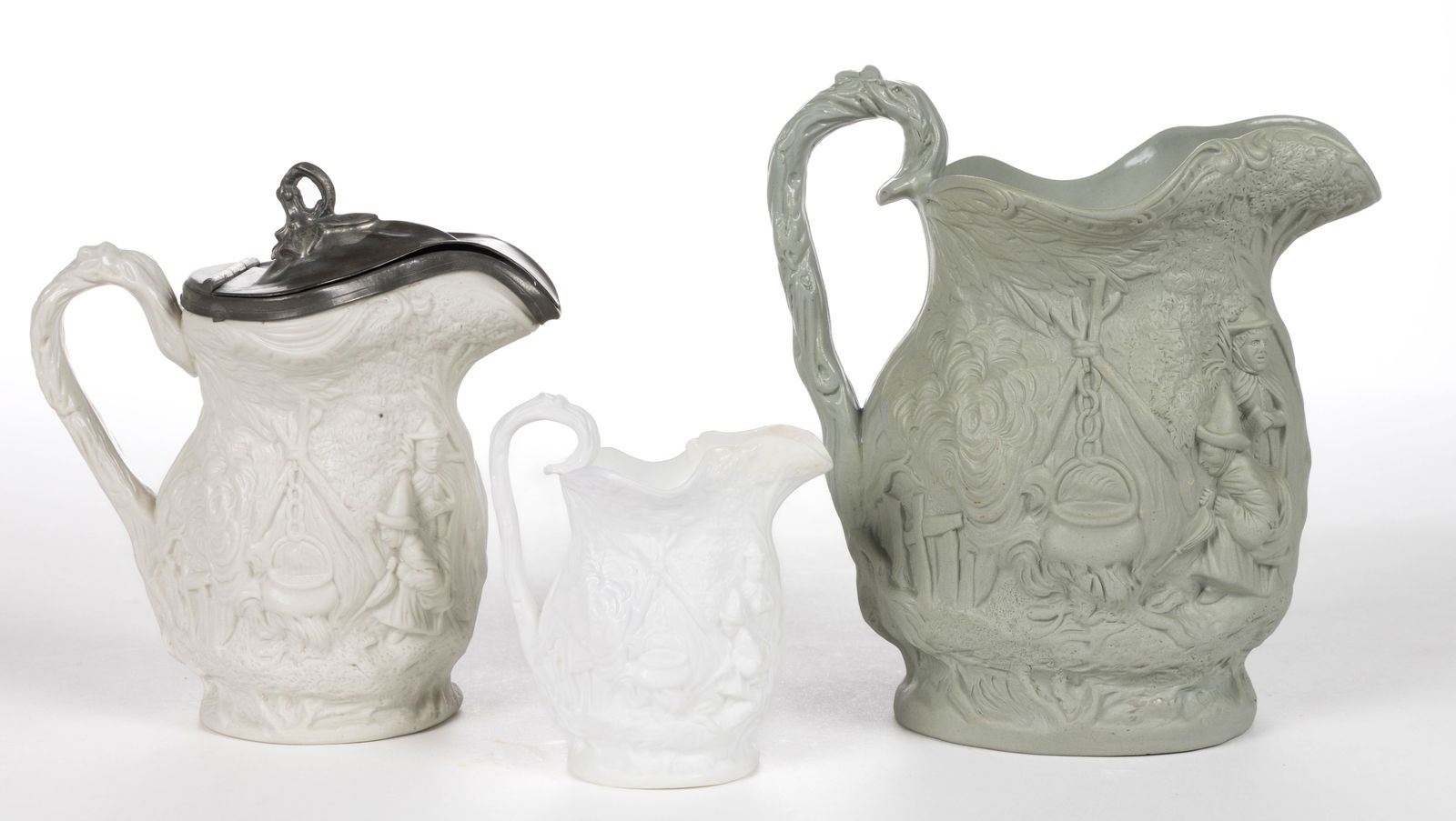 ENGLISH RELIEF-MOLDED "GIPSEY" STONEWARE JUGS / PITCHERS, LOT OF THREE (1 of 2)