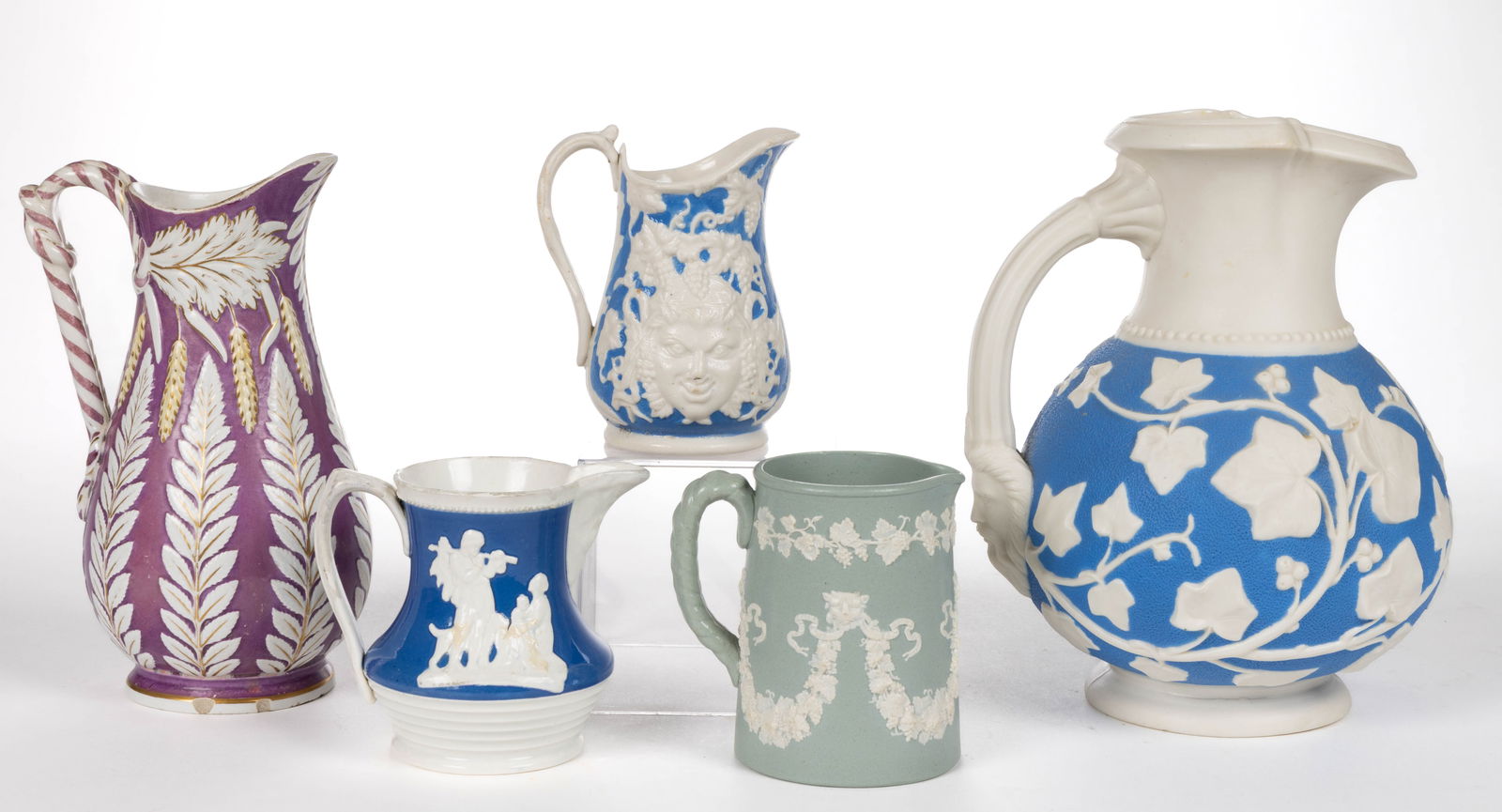 ENGLISH RELIEF-MOLDED STONEWARE JUGS / PITCHERS, LOT OF FIVE (1 of 2)