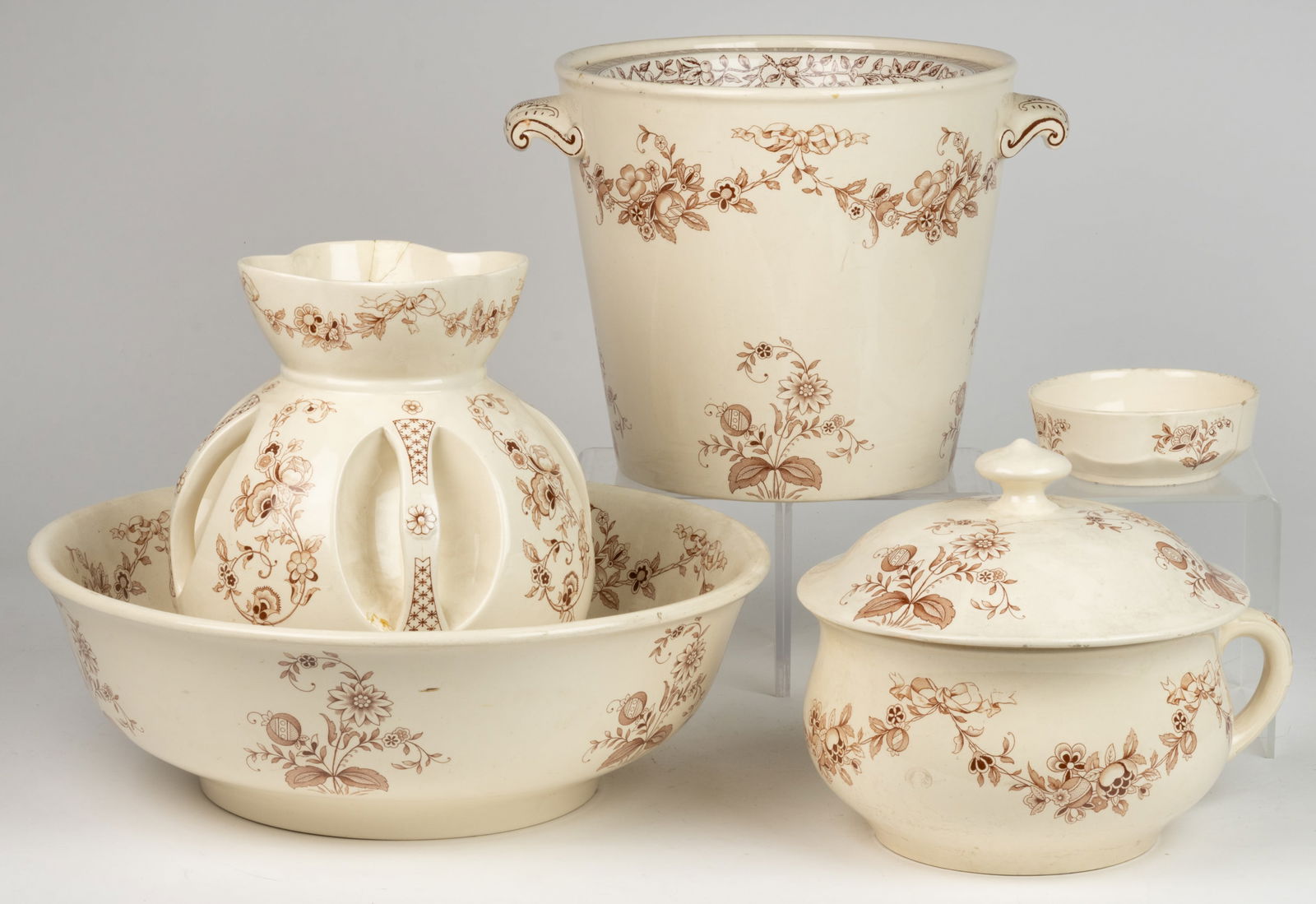 ENGLISH OETZMANN'S PATENT FIVE-PIECE CHAMBER SET: ENGLISH OETZMANN'S PATENT FIVE-PIECE CHAMBER SET, Cephalonia pattern, comprising a strange four-handled and four-spouted pitcher with wash bowl; a large waste pot with an associated insert wi