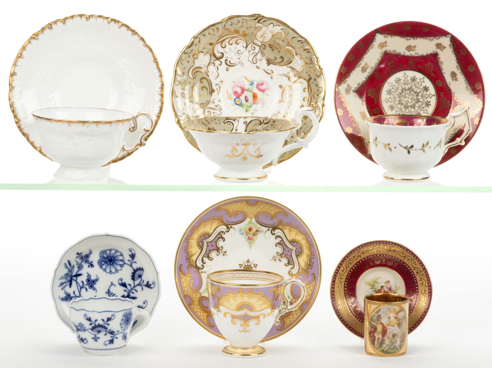 ASSORTED PORCELAIN CUP AND SAUCER SETS, LOT OF SIX: ASSORTED PORCELAIN CUP AND SAUCER SETS, LOT OF SIX, including one Davenport set featuring polychrome hand-painted floral bouquet, one Copeland set polychrome hand-painted floral decoration and lavende