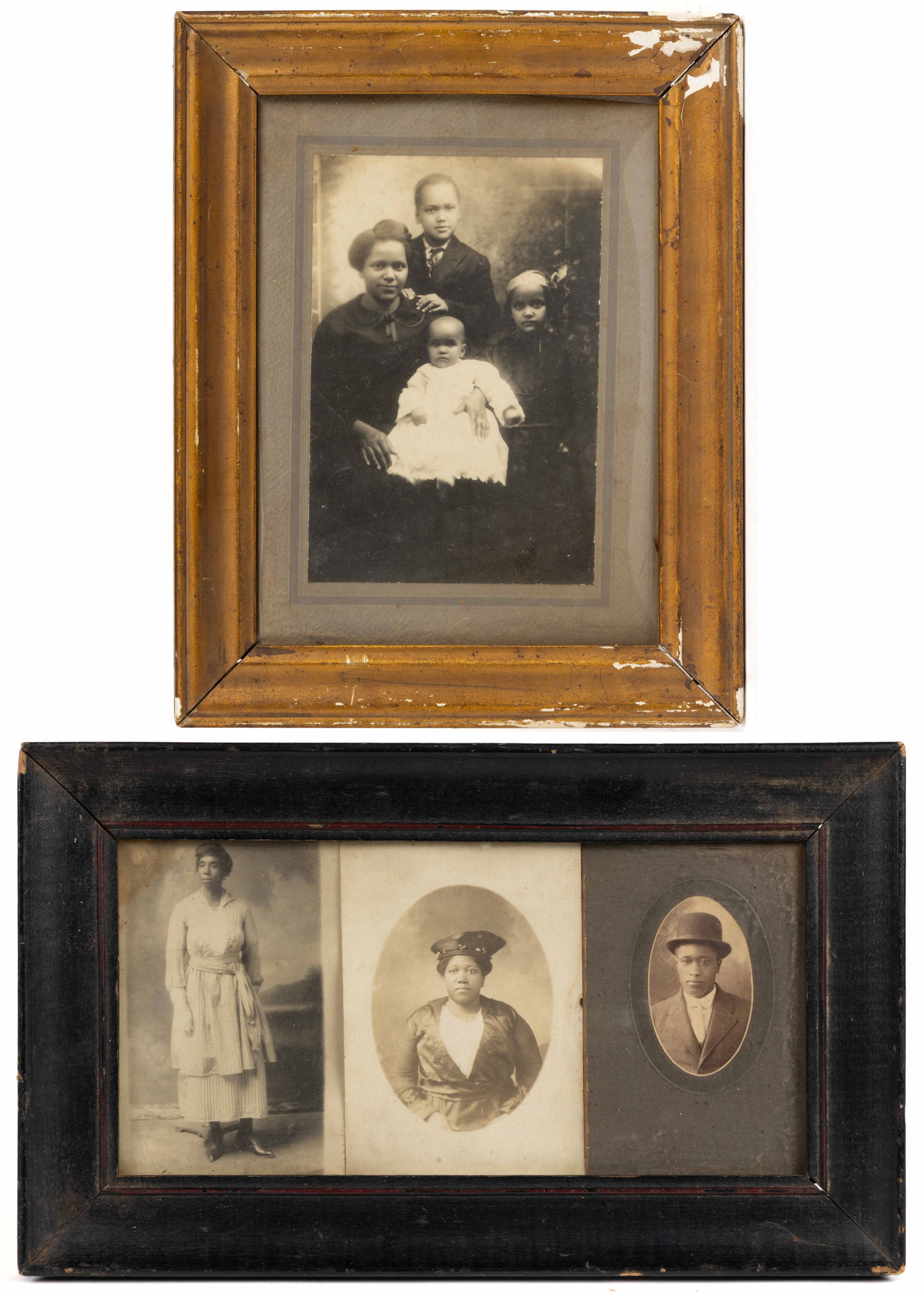 BALTIMORE, MARYLAND AFRICAN AMERICAN FAMILY PHOTOGRAPHS IN TWO FRAMES: BALTIMORE, MARYLAND AFRICAN AMERICAN FAMILY PHOTOGRAPHS IN TWO FRAMES, comprising two real-photo postcard examples and two on board, three are single shots showing figures in their fine clothes, one i