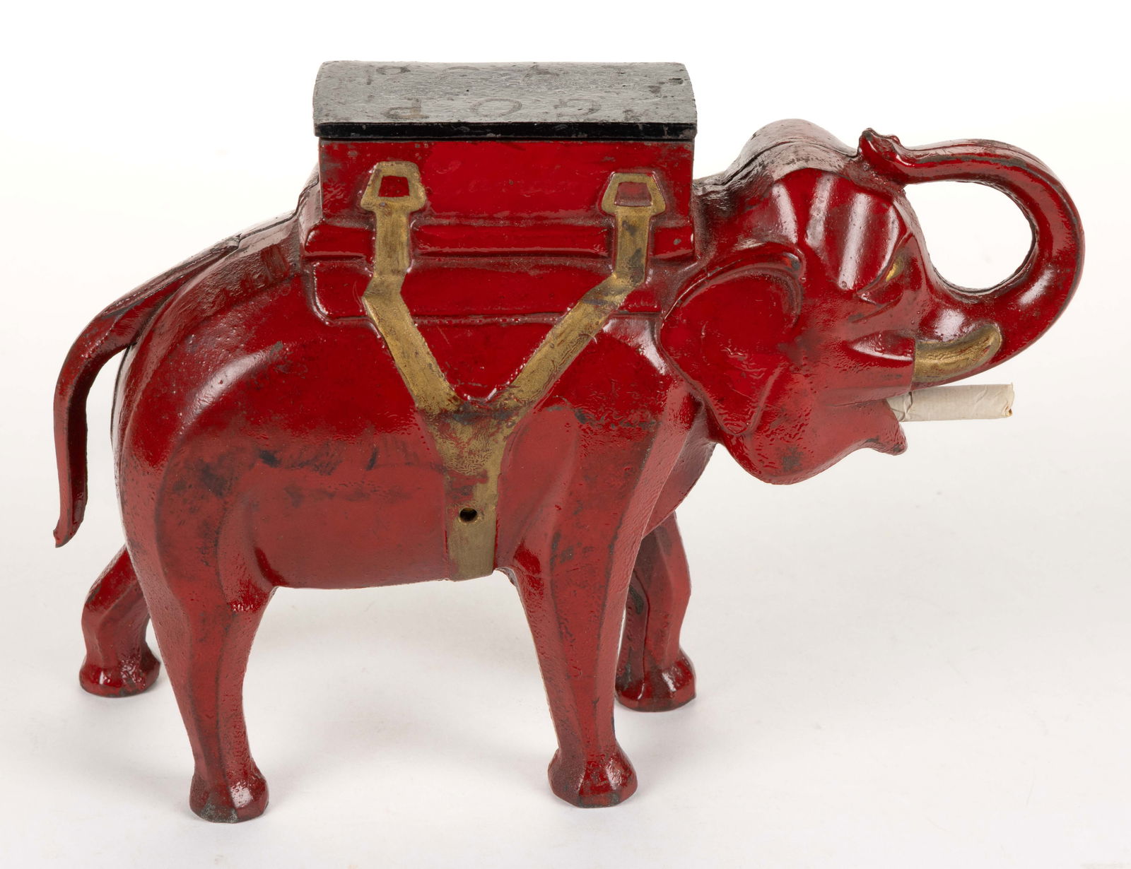 CAST-IRON FIGURAL ELEPHANT AND 1936 POLITICAL LANDON PRESIDENTIAL CAMPAIGN TABLE-TOP CIGARETTE (1 of 3)