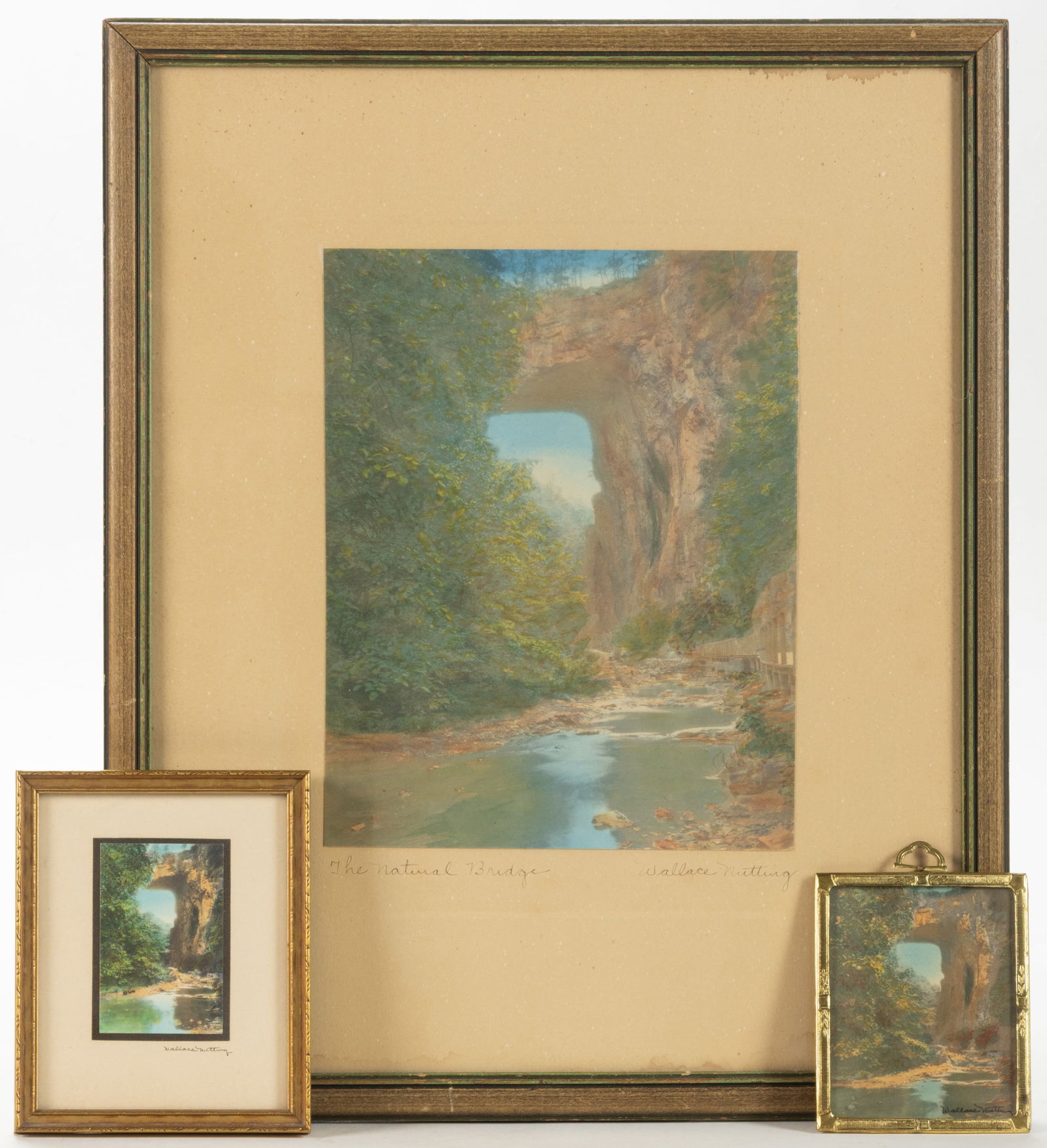 NATURAL BRIDGE, SHENANDOAH VALLEY OF VIRGINIA, WALLACE NUTTING LANDSCAPE PRINTS, LOT OF THREE: NATURAL BRIDGE, SHENANDOAH VALLEY OF VIRGINIA, WALLACE NUTTING LANDSCAPE PRINTS, LOT OF THREE, hand-colored prints, each a variation on the same scene, each signed "Wallace Nutting", the lar