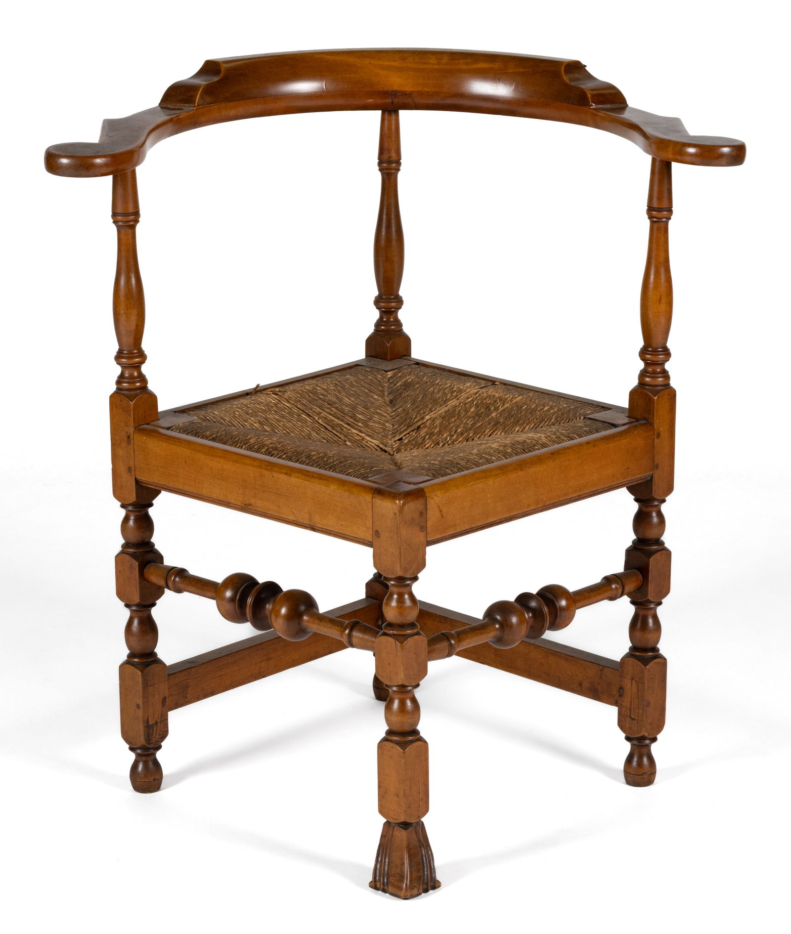 NEW ENGLAND WILLIAM AND MARY MAPLE CORNER CHAIR: NEW ENGLAND WILLIAM AND MARY MAPLE CORNER CHAIR, with molded crest rail, removable woven-rush slip seat, bold turnings, and Spanish front foot. Retaining an old surface with warm color. 18th century.