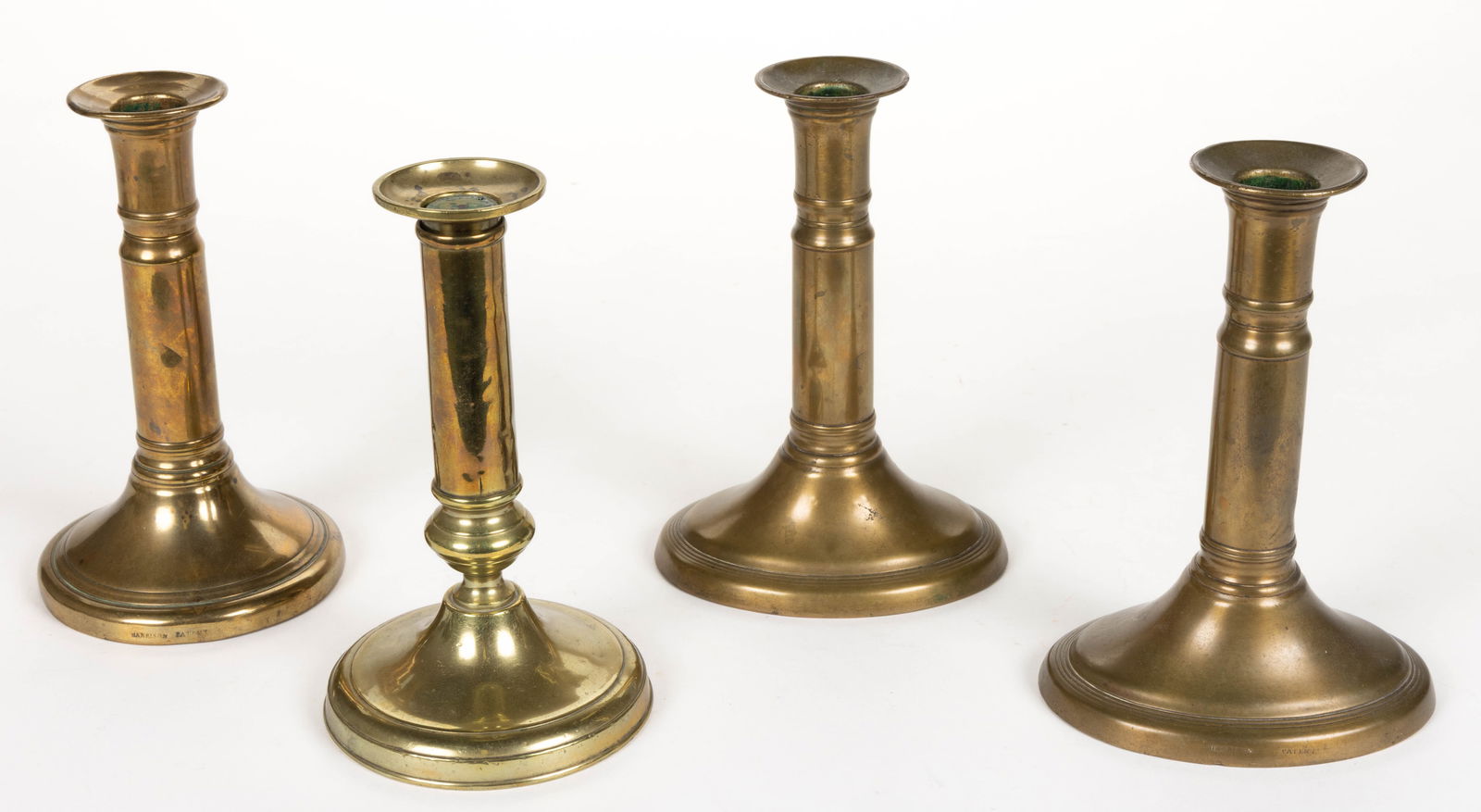 ASSORTED HARRISON PATENT AND OTHER ENGLISH BRASS TELESCOPING CANDLESTICKS, LOT OF FOUR (1 of 2)