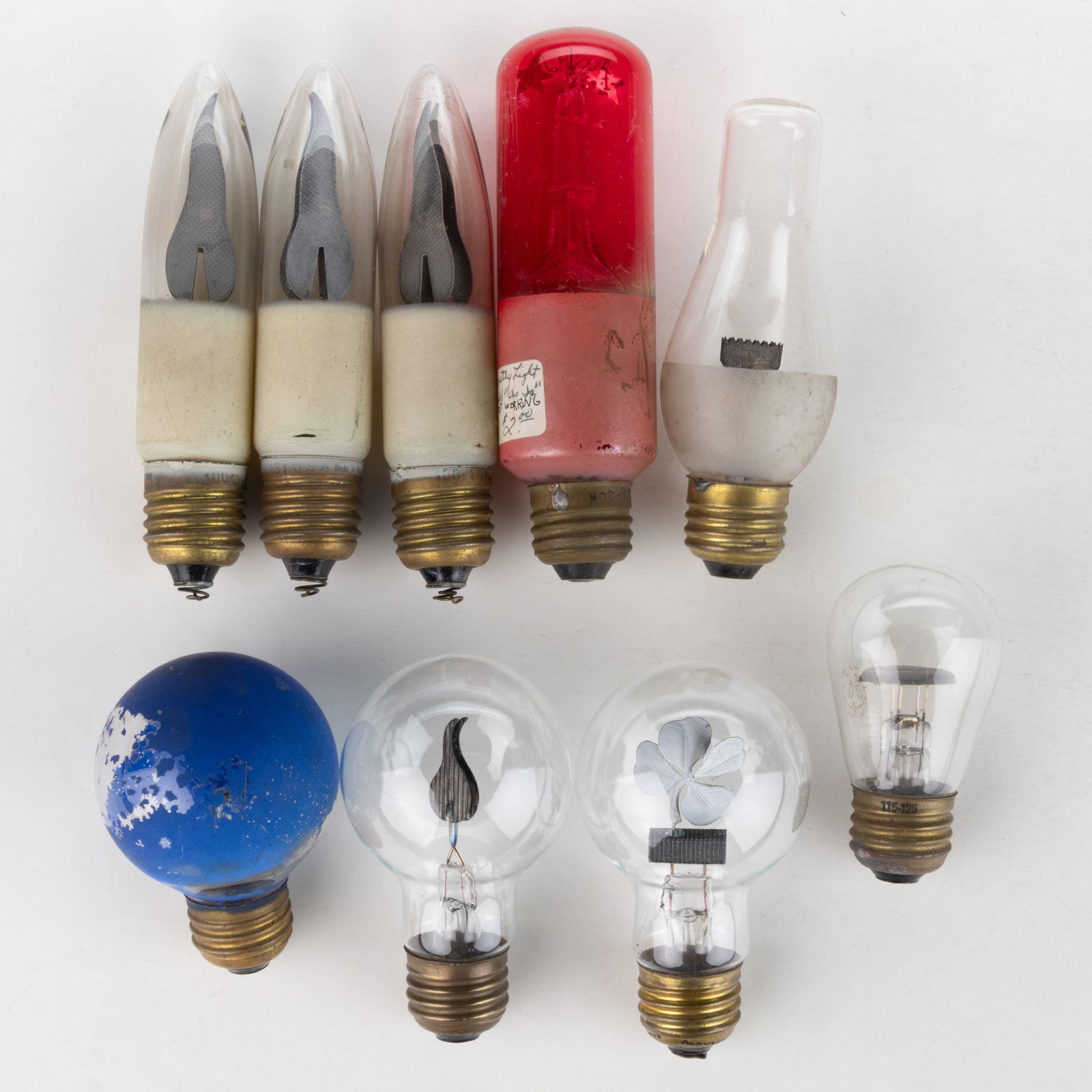 ASSORTED VINTAGE AEROLUX-STYLE FLAME FIGURAL FILAMENT AND OTHER NOVELTY LIGHT BULBS, LOT OF NINE (1 of 1)