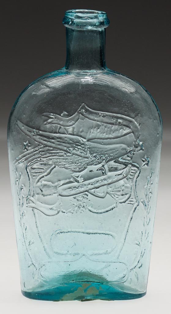 GXII-21 CLASPED HANDS AND EAGLE HISTORICAL FLASK: GXII-21 CLASPED HANDS AND EAGLE HISTORICAL FLASK, aquamarine, pint, obverse embossed "UNION" above shield, reverse embossed "A & CO" in lower pennant, applied collared mouth, smooth base with central 