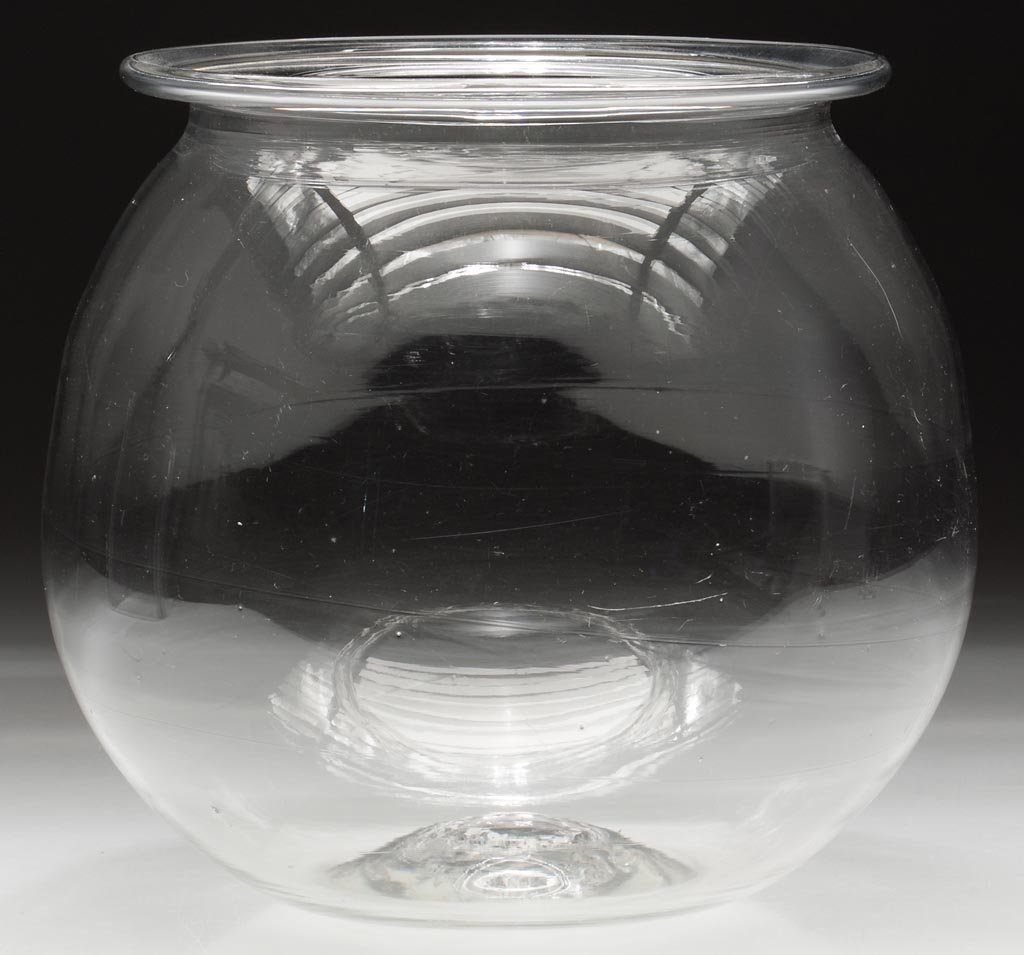 FREE-BLOWN FISH GLOBE: FREE-BLOWN FISH GLOBE, colorless, folded rim and rough pontil mark. United States. Second half 19th century. 8" H, 7 1/4" D rim. Provenance: The estate collection of Richard and Betty Robertson, Wayne
