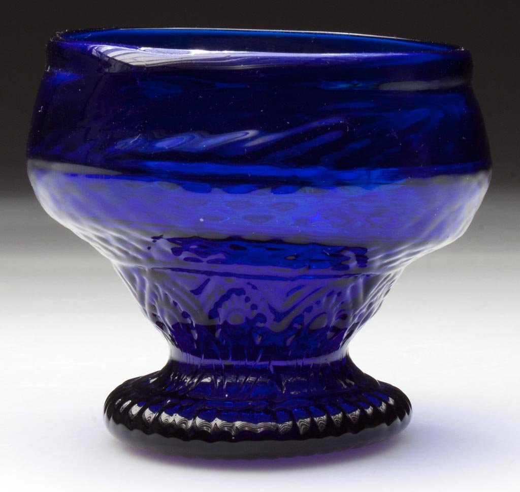 BLOWN-MOLDED GIII-23 FOOTED SALT: BLOWN-MOLDED GIII-23 FOOTED SALT, brilliant cobalt blue, ogee form with lightly tooled rim, drawn foot with rayed base and rough pontil mark. Boston & Sandwich Glass Co. 1825-1835. 2 1/2" H, 2 5/8" D 