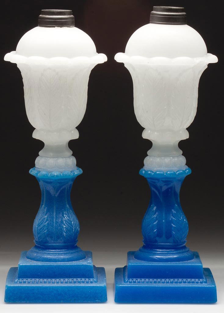 PAIR OF PRESSED ACANTHUS LEAF STAND LAMPS: PAIR OF PRESSED ACANTHUS LEAF STAND LAMPS, translucent alabaster/clambroth fonts, starch blue bases, overall sanded surfaces, large size, each dome-top font with 12 protruding petals below the shoulde