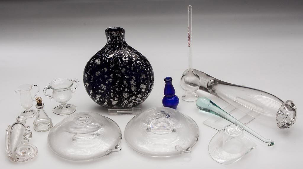 ASSORTED BLOWN MINIATURE AND OTHER ARTICLES, LOT OF 12: ASSORTED BLOWN MINIATURE AND OTHER ARTICLES, LOT OF 12, including two nipple shells, a deep cobalt blue cased colorless flask with mica flakes, etc. 19th and 20th century. Flask 3 3/4" H. Literature: