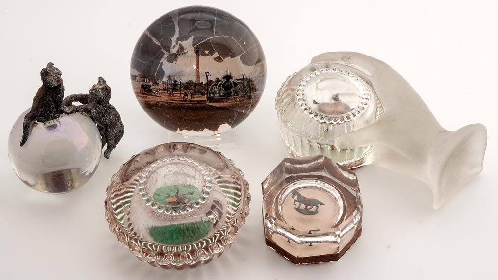 ASSORTED ANTIQUE PAPERWEIGHTS, LOT OF FIVE: ASSORTED ANTIQUE PAPERWEIGHTS, LOT OF FIVE, including three featuring enclosed animals with moving parts and an example with attached white-metal cats, one with a nodder head. Second half 19th to earl
